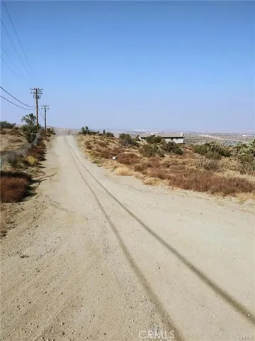 Rural with many homes sourranding the area.