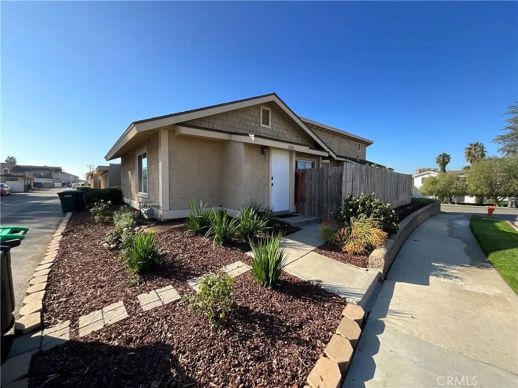 Unit 1404 is a one bedroom, one bath with central air/heat a one car garage and a patio corner unit.