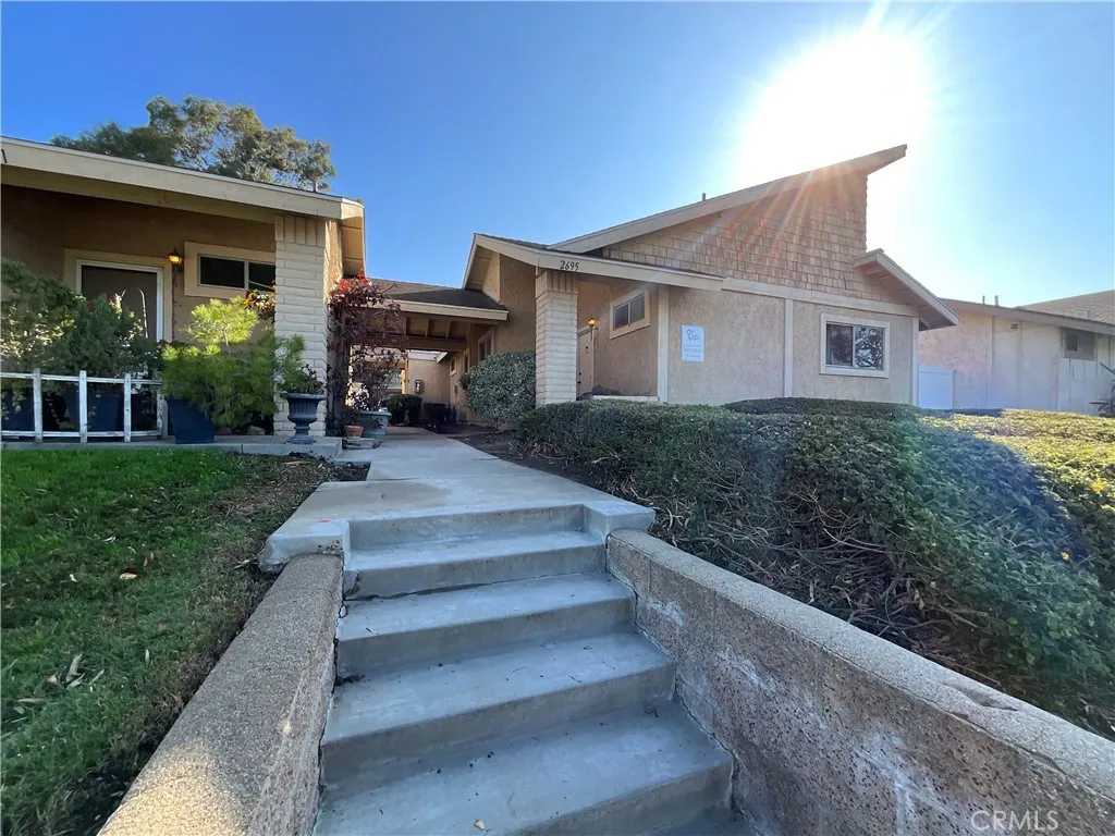 2695 is the building to the right two bedrooms, two bath central air and heat, one car garage and a patio