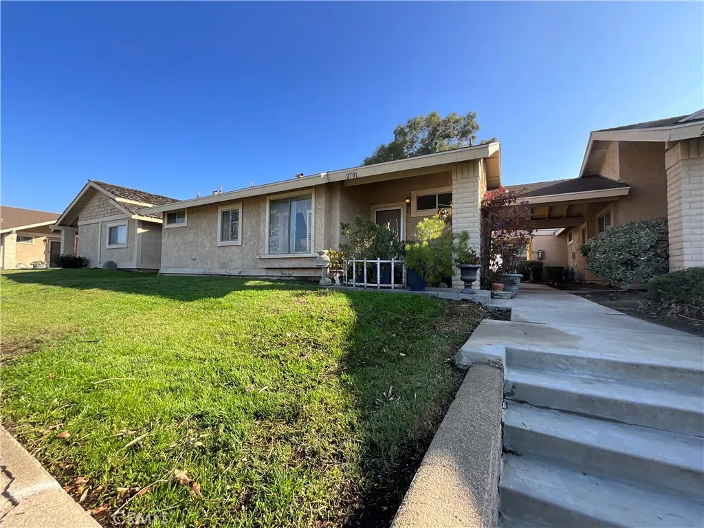 Unit Two is 2701 a 2 bedroom, two bath with central air/heat one car garage and a patio