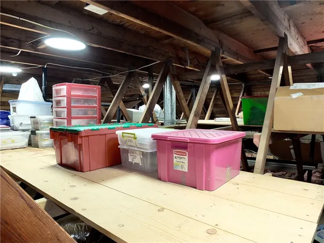 Wall to all attic storage.