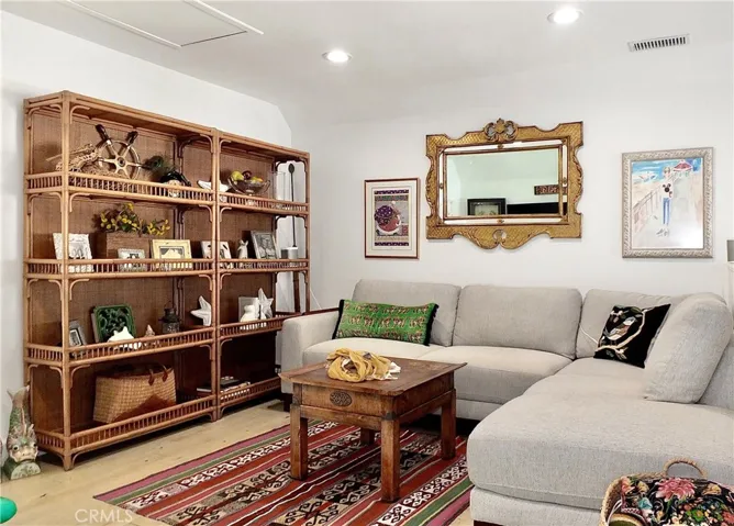 Second floor entertainment space. Pull down attic access to huge storage space.