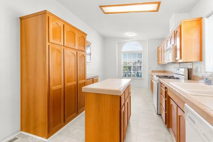 Kitchen with upgraded counter tops and Microwave/Stove/Dishwasher/Refrigerator (New paint & Flooring) (Turn key-Move IN Ready)