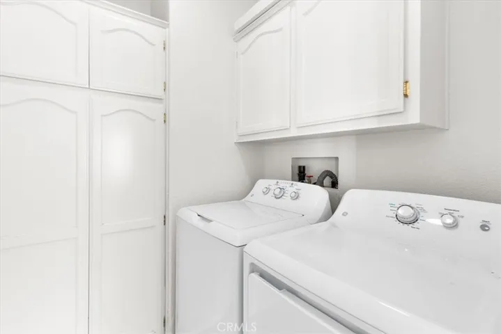 Separate Laundry Room w/ washer  & Dryer (New paint & Flooring)