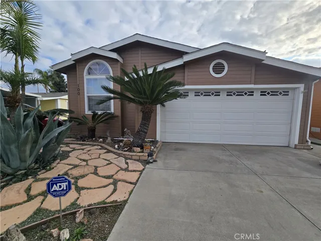 The front of this stunning manufactured home exudes charm and curb appeal, sitting proudly on a desirable corner lot.