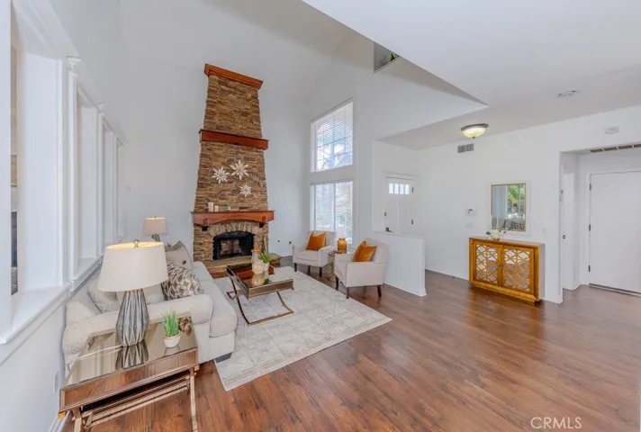 Living room and entry with a picture window facing the west.