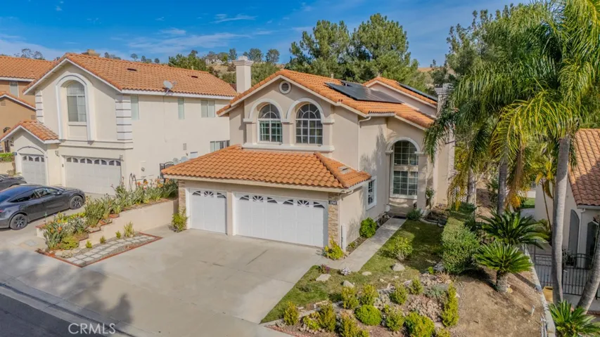 Overhead view of the front of the home facing west.