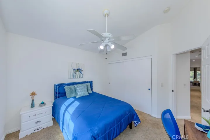 Northwest view of one of the upstairs bedrooms.