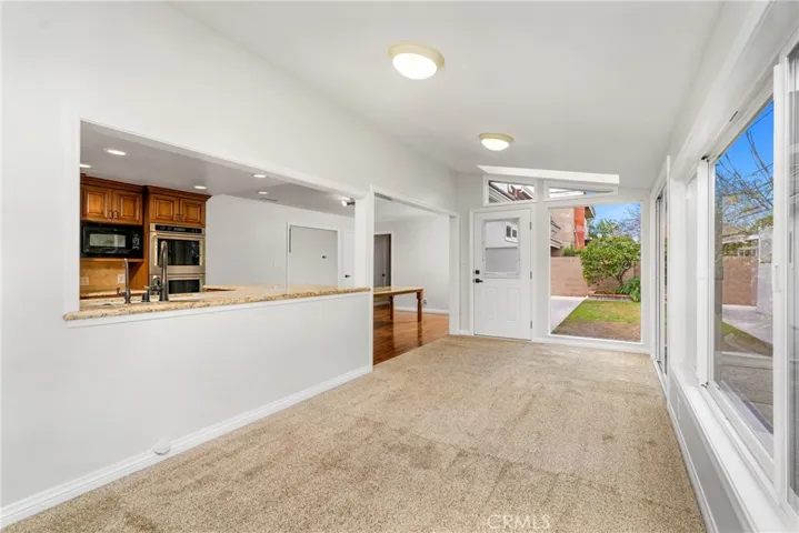 With two skylights, and two sliding doors to the backyard!