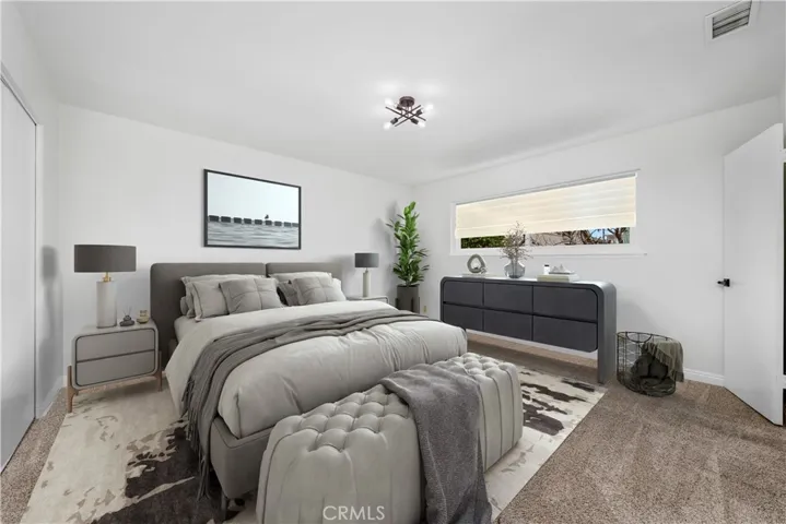 Downstairs primary  bedroom virtually staged!