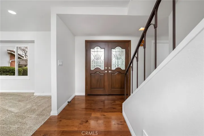 The home is accented with carpet and wood flooring throughout.