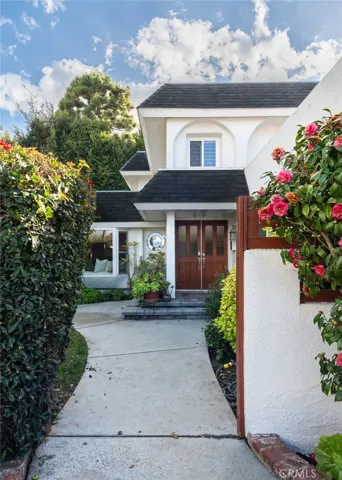 The walkway leads you to the entry courtyard...