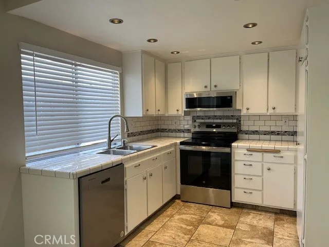 New appliances include dishwasher, range, microwave