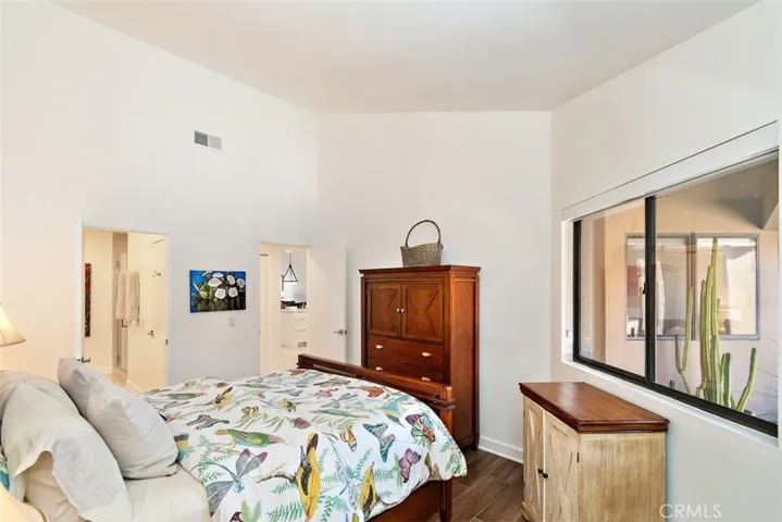 Guest Bedroom. Large window to the private Patio