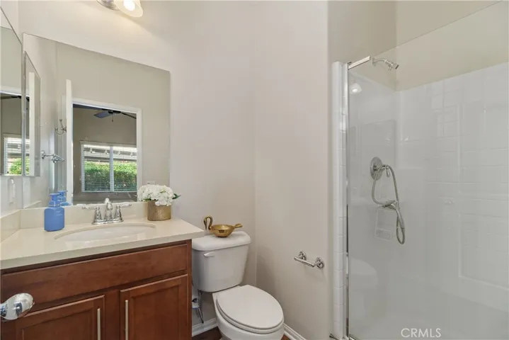 Ensuite bathroom with walk-in shower. perfect for guests or live-in assistance.