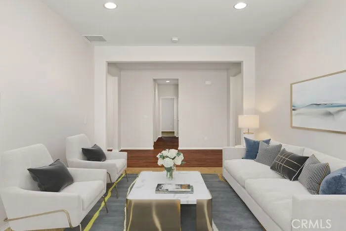 An additional flex room offers many options. This space can be used as shown (virtually staged) living room, or a den, office, bonus room or with added doors a 5th bedroom.