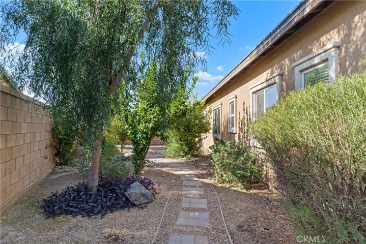 Cozy walkway to an additional patio