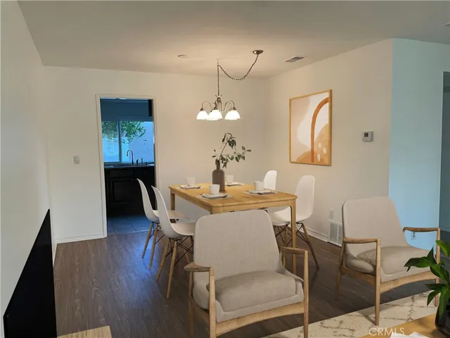 Dining room virtually staged.