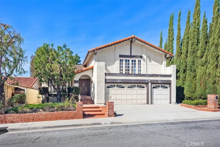 Cul de sac view home with pool and tons of opportunity