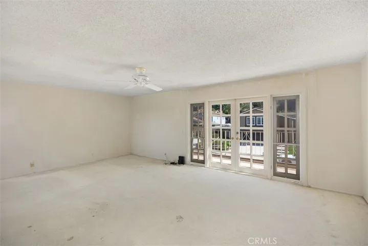 Owner's suite is expansive with en-suite, tons of closet space, and outside balcony.