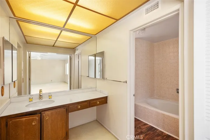 Owner's suite is expansive with en-suite, tons of closet space, and outside balcony.