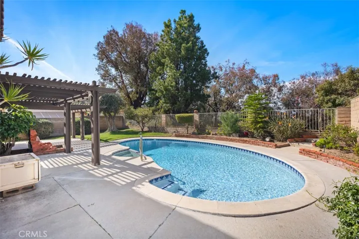 Cul de sac view home with pool and tons of opportunity