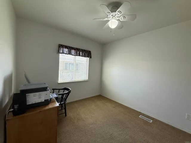 Bedroom 3 - updated view with less furniture
