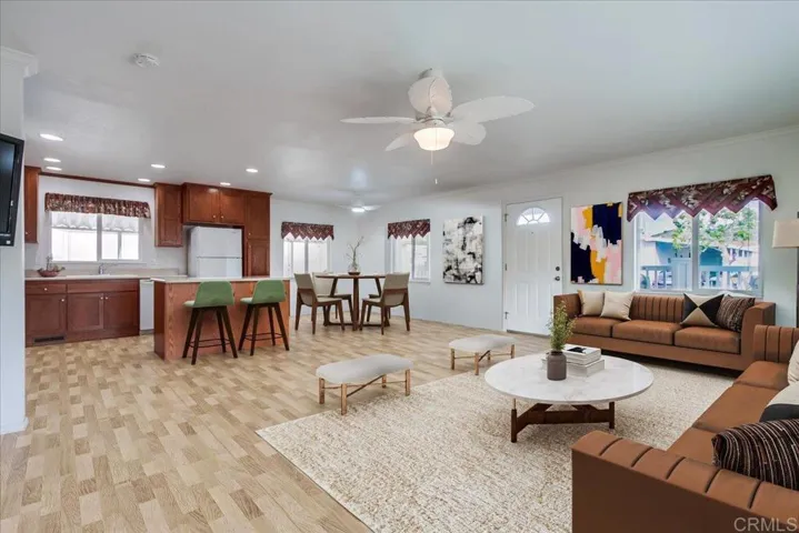 Virtually staged photo -- both furniture and flooring are staged - see original photo