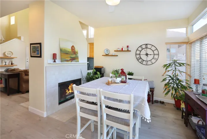 Breakfast nook with fireplace, and patio