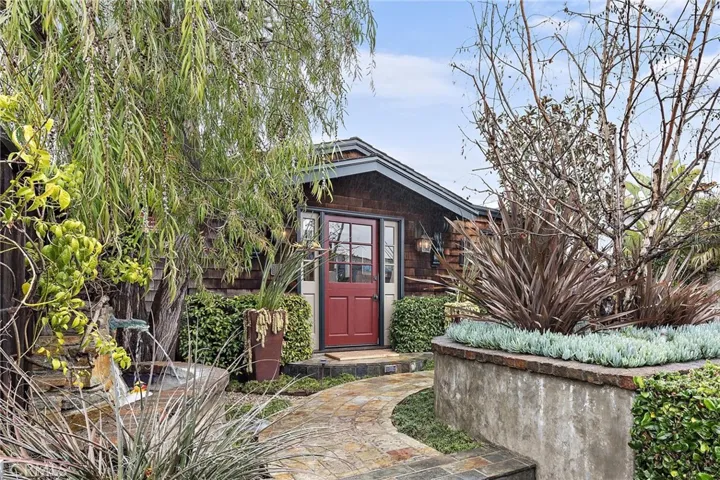 Stone and custom brick work greet you're entry