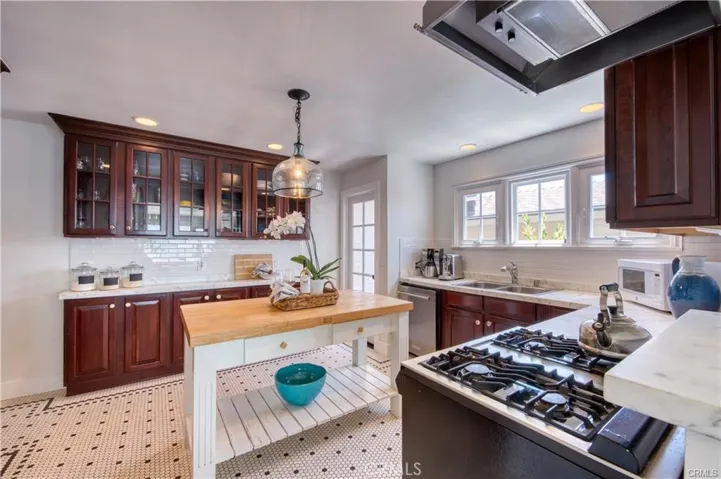 Updated kitchen with marble countertops and all the culinary supplies you would need!