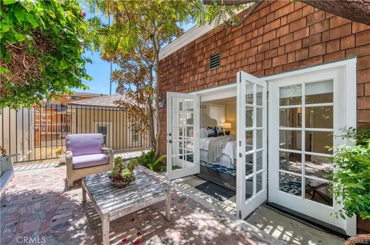 Private patio between guest house and main home off secondary bedroom.