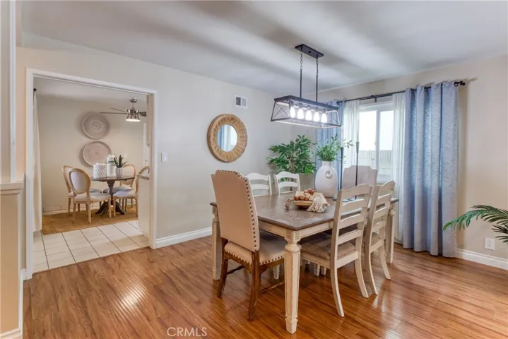 Dining Area & beautiful wood laminate flooring throughout the home
