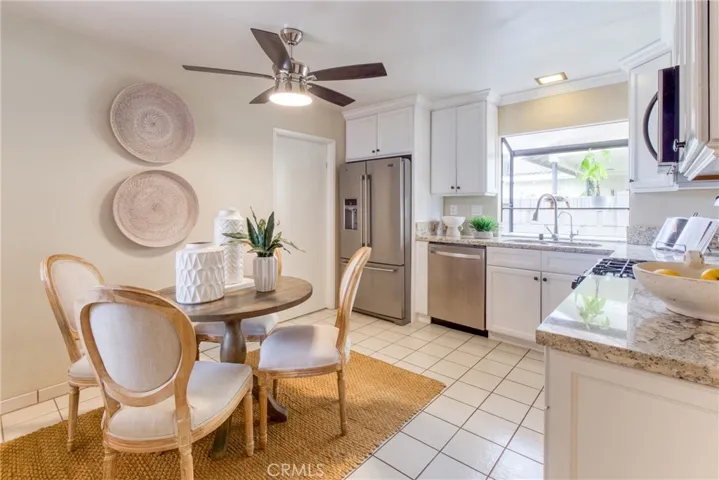 Charming kitchen featuring a casual breakfast nook area