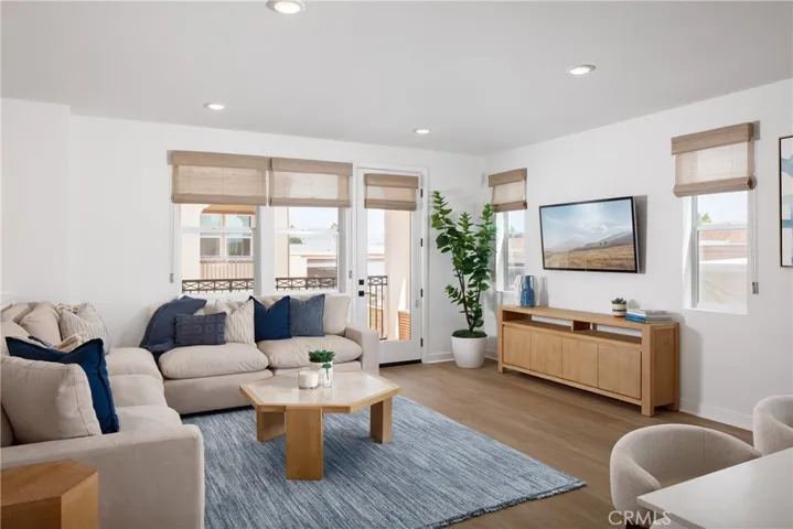 The large great room with lots of windows for abundant natural light.