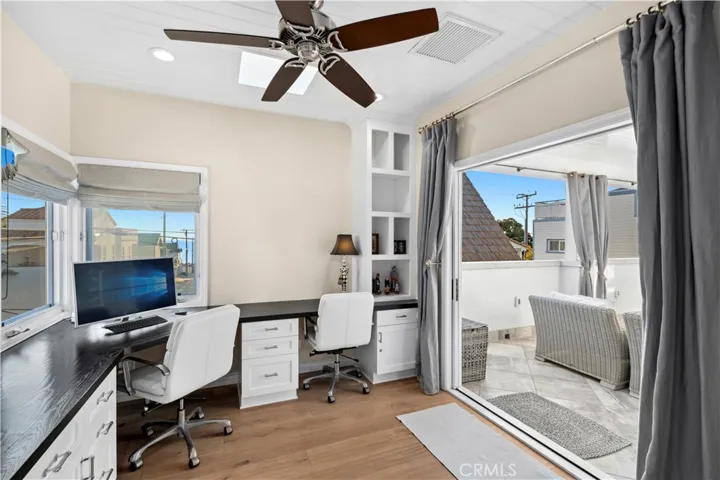The office and 4th guest bedroom are accessed from the patio.