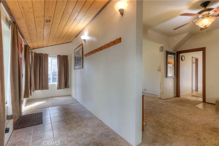 Entrance of the home: Mud room looking into the living room.
