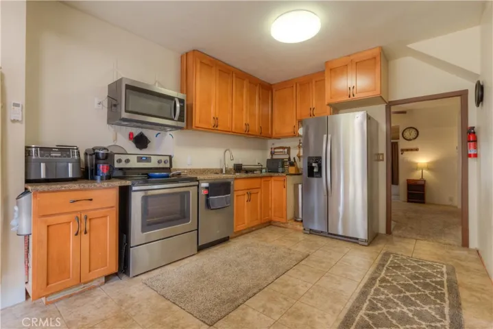Kitchen with hall appliances included.