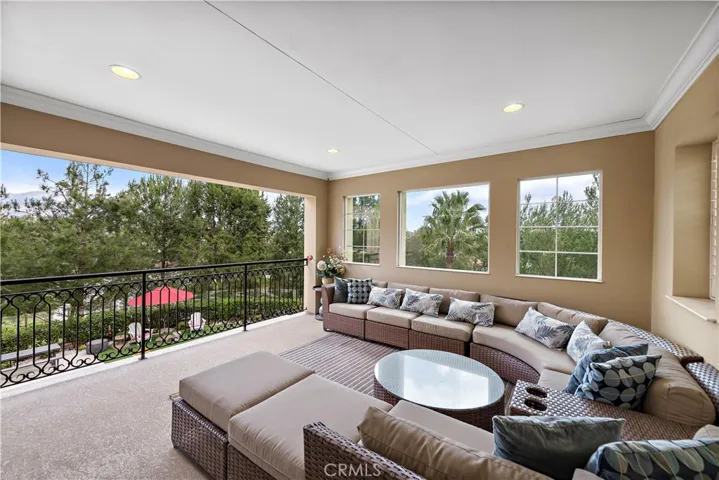Covered balcony with mountain views.