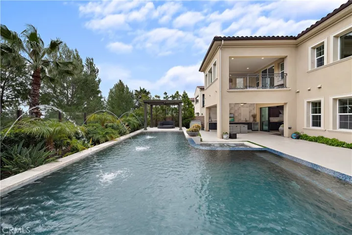 Infinity pool with water features.