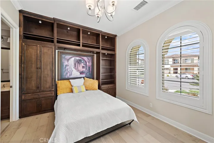 Downstairs bedroom #5 with built-in murphy bed.