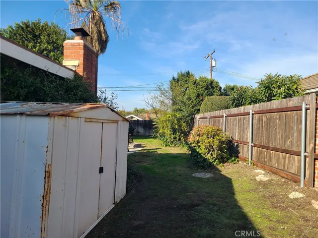 if you remove the shed, the side yard can accommodate an RV or boat. Both of which have been parked here over the years. Simply modify the existing fence with a gate.