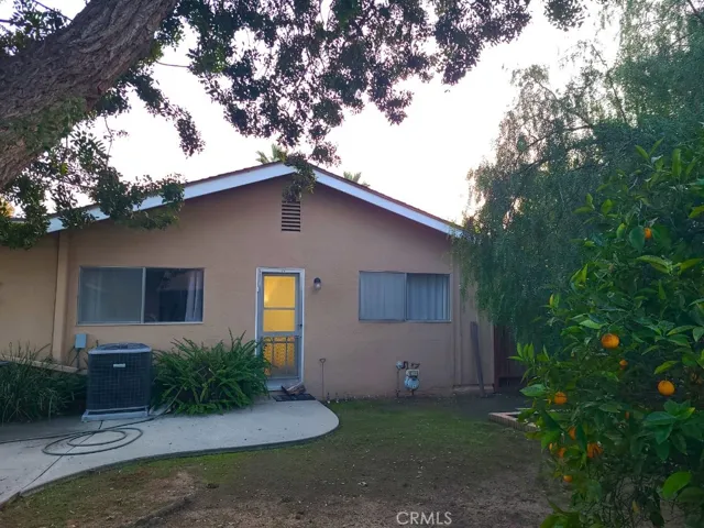bedrooms 3 and 4 look out over backyard with direct access to the hallway from the yard- perfect if you plan to add a pool