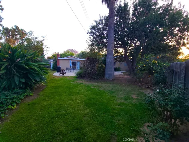 From corner of property looking south along fence line to proposed rv parking side yard