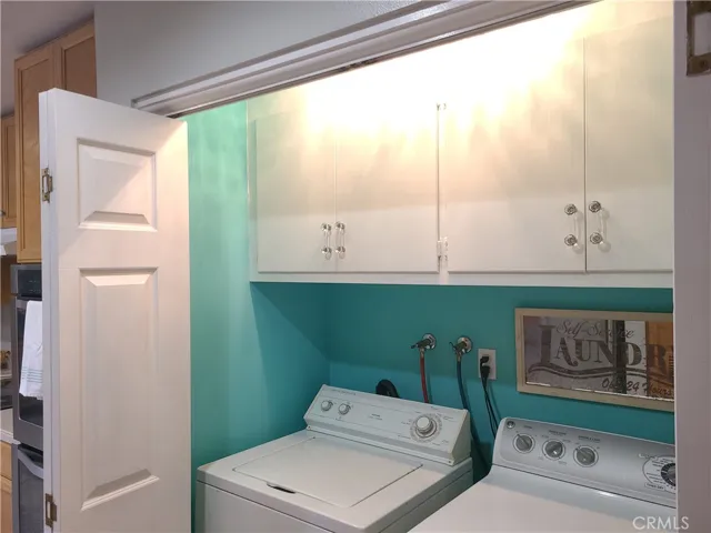 Laundry closet in kitchen