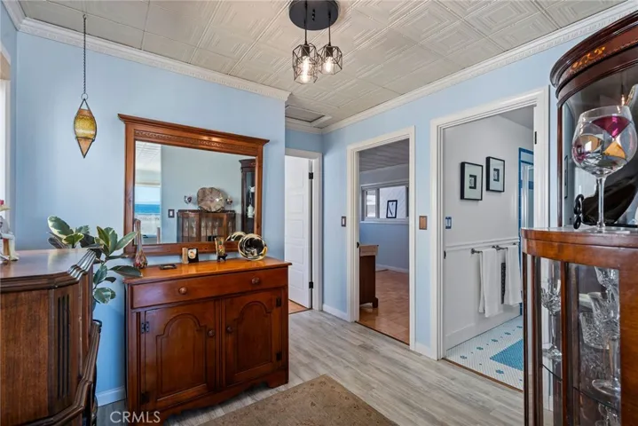 Hallway leads to the two upstairs bedrooms
