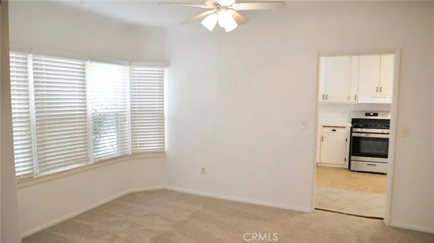 BONUS ROOM WITH TWO CEILING FANS AND LOTS OF NATURAL LIGHTING