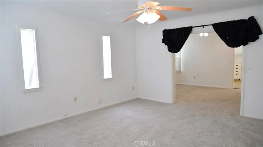LIVING ROOM WITH NEW CARPET