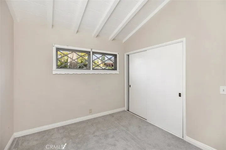 Second bedroom with generous sized closet not staged.