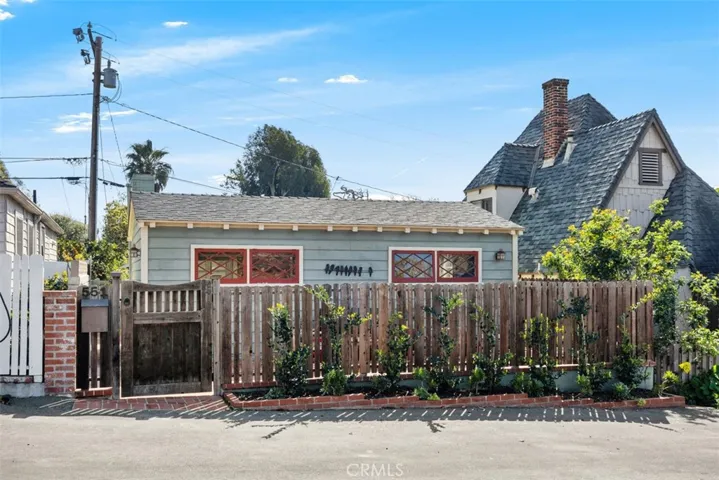 Front of home has parking as well as back side of home. Street to street lot.